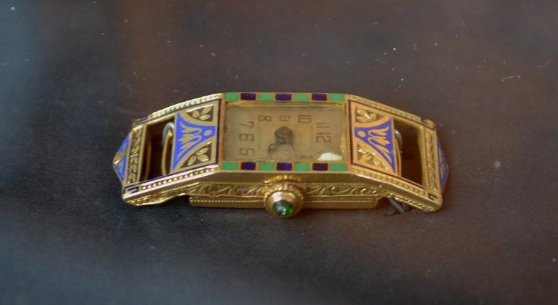 Framed gold art deco watch