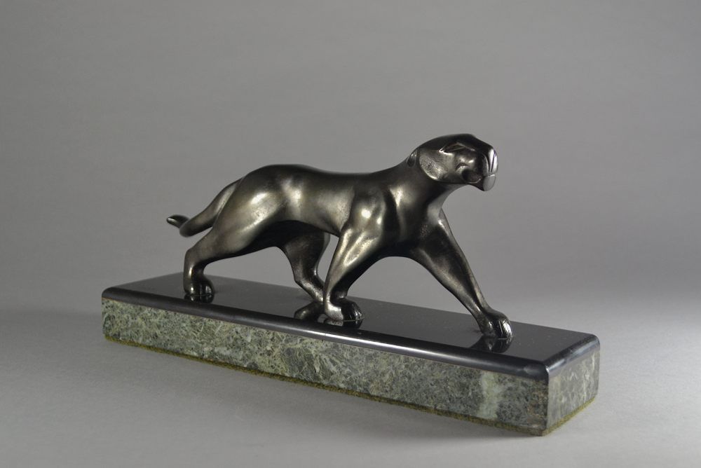 Michel Decoux. An art deco bronze panther on marble base