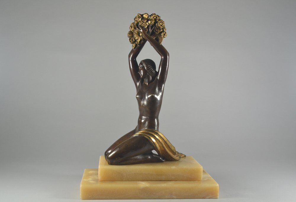 Rare R. Guerbe bronze art deco figure of a lady with bunch of flowers