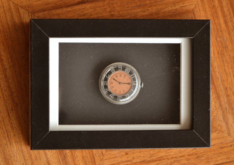 Framed skeleton art deco watch