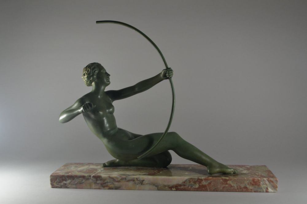 Art deco metal sculpture signed Oudine. Diana huntress