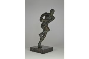 Art deco metal sculpture of a Rugby Player