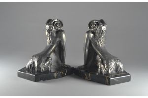 Pair of art deco bronze bookends with fauns. Signed