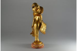 Elegant parisian lady with a hat. Georges Flamand bronze sculpture