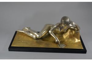 D. Grisard large art deco bronze reclining flapper. 