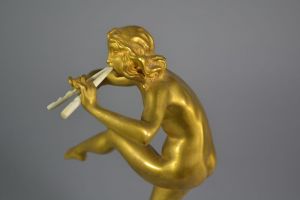 Rare Pierre Le Faguays gilded bronze sculpture. Dancer with pipes