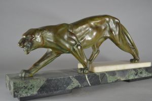 Large art deco metal panther on green marble base