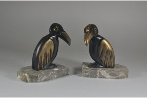 H. Moreau bookends pair with stylized toucans. Glass eyes